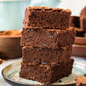 square image of a stack of mexican brownies on a plate