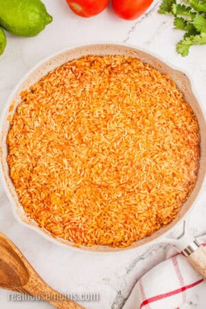 cooked mexican rice in a large skillet before fluffing the rice