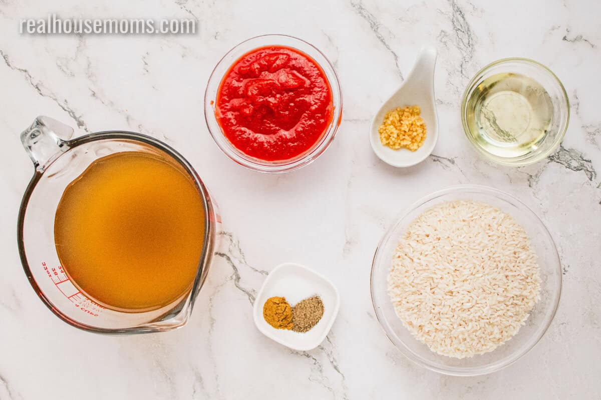 looking down at ingredients to make mexican rice on a counter
