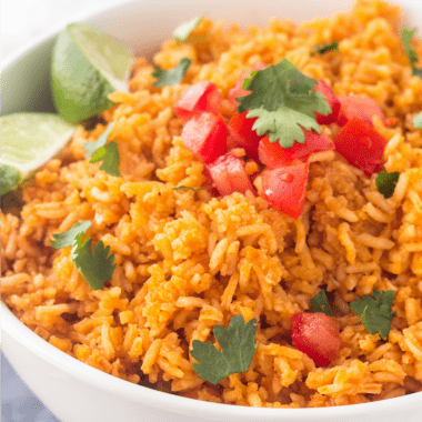 Easy, homemade Mexican Rice Recipe is the perfect side dish whenever you're making Mexican food. So delicious & just like your favorite Mexican restaurant!