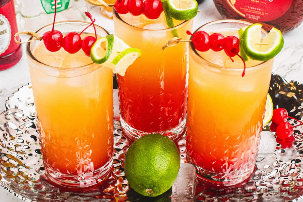 mexican sunset on a silver tray with a lime