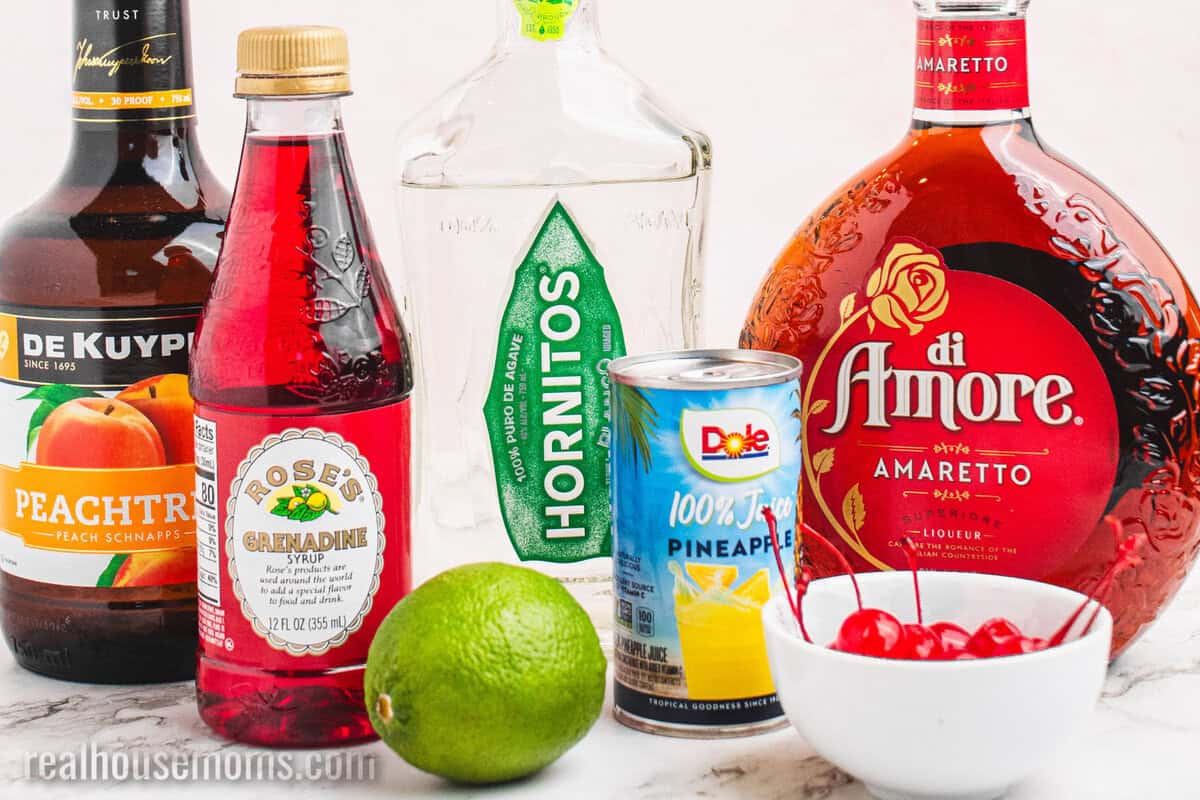 ingredients to make a mexican sunset cocktail on a counter