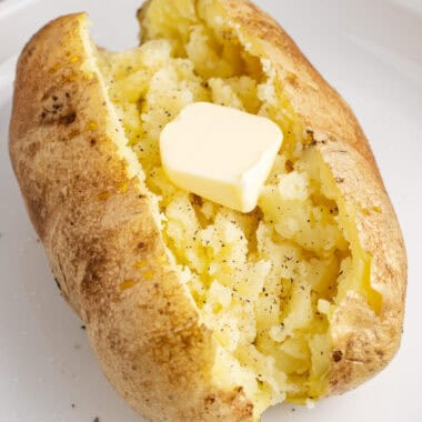 square image of baked bopatoe with a swuare of butter