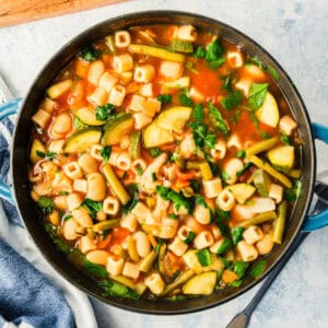 square image looking down at a pot of minestrone soup