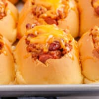 close up of a mini chili cheese dog bake with recipe name at the bottom