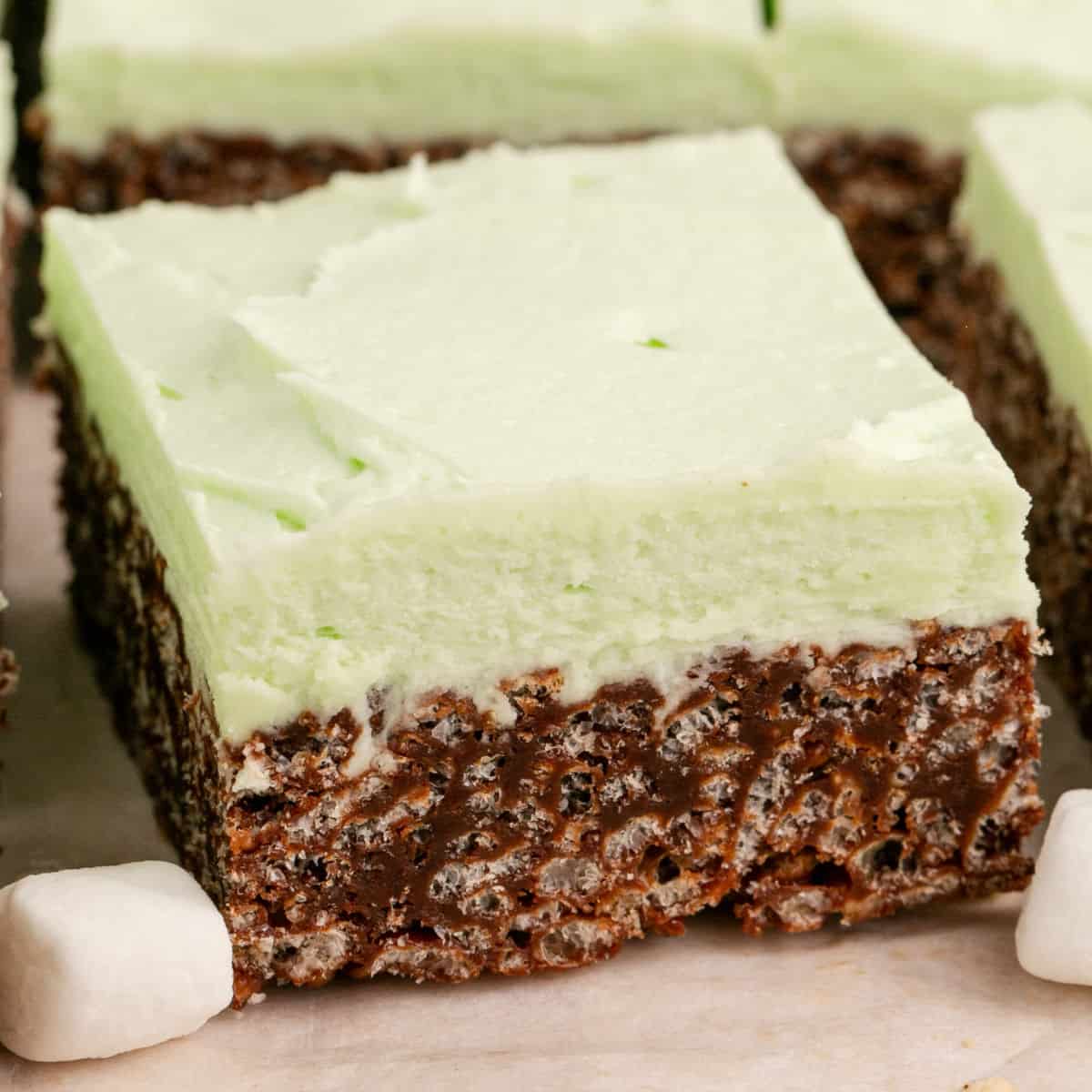 square close up image of a mint chocolate rice krispie treat