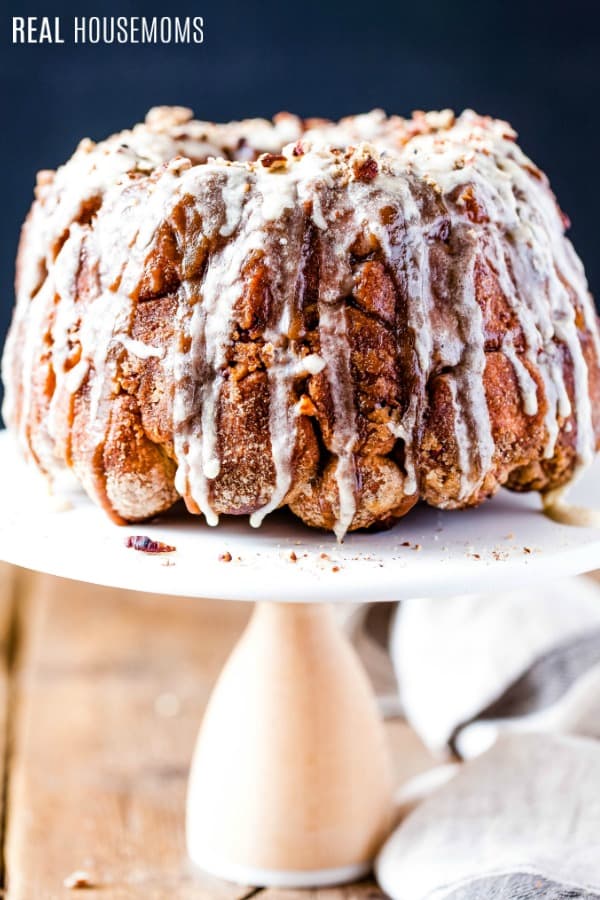 monkey bread drizzled with brown sugar sauce and vanilla glaze