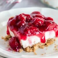 No Bake Cherry Cheesecake is ridiculously easy to make and a total crowd pleaser! Make a double batch and watch it fly off the pan!