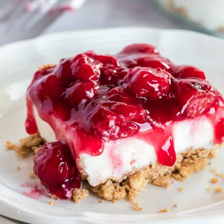 No Bake Cherry Cheesecake is ridiculously easy to make and a total crowd pleaser! Make a double batch and watch it fly off the pan!
