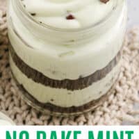 looking down at a jar of no bake mint chocolate chip cheesecake with recipe name at the bottom