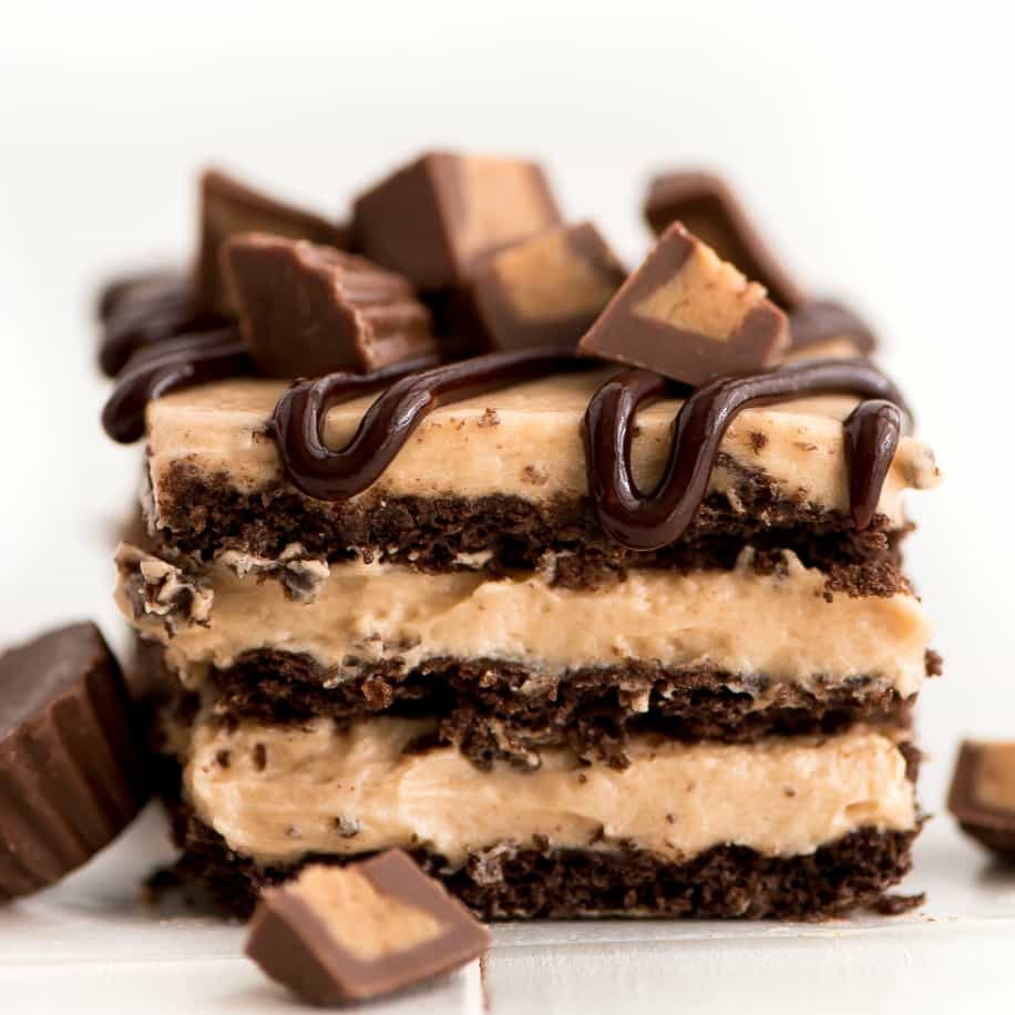 This No-Bake Peanut Butter Icebox Cake is a super easy dessert for a crowd. With layers of fluffy peanut butter cream cheese filling between sweet chocolate graham crackers, what's not to love?!