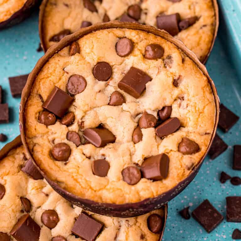 square image of a num num cookie stack on top of other cookies