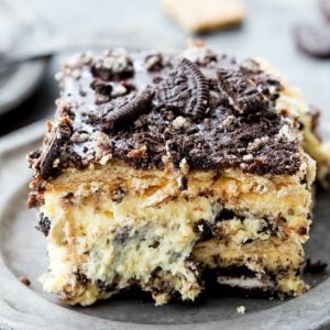 Oreo Cheesecake Icebox Cake is loaded with layers of graham crackers, no bake cheesecake, and OREOS for an easy, no-bake dessert you'll crave!