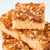 square image of oatmeal sour cream coffee cake square stacked up