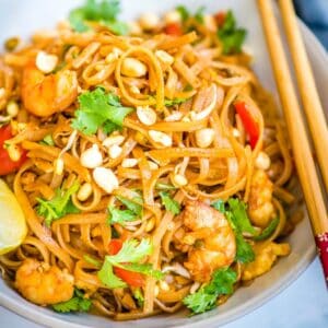 Pad Thai is a one-pot dish made with flat rice noodles, chicken or shrimp, bean sprouts, and a sweet-savory sauce. It's healthy and easy to make!