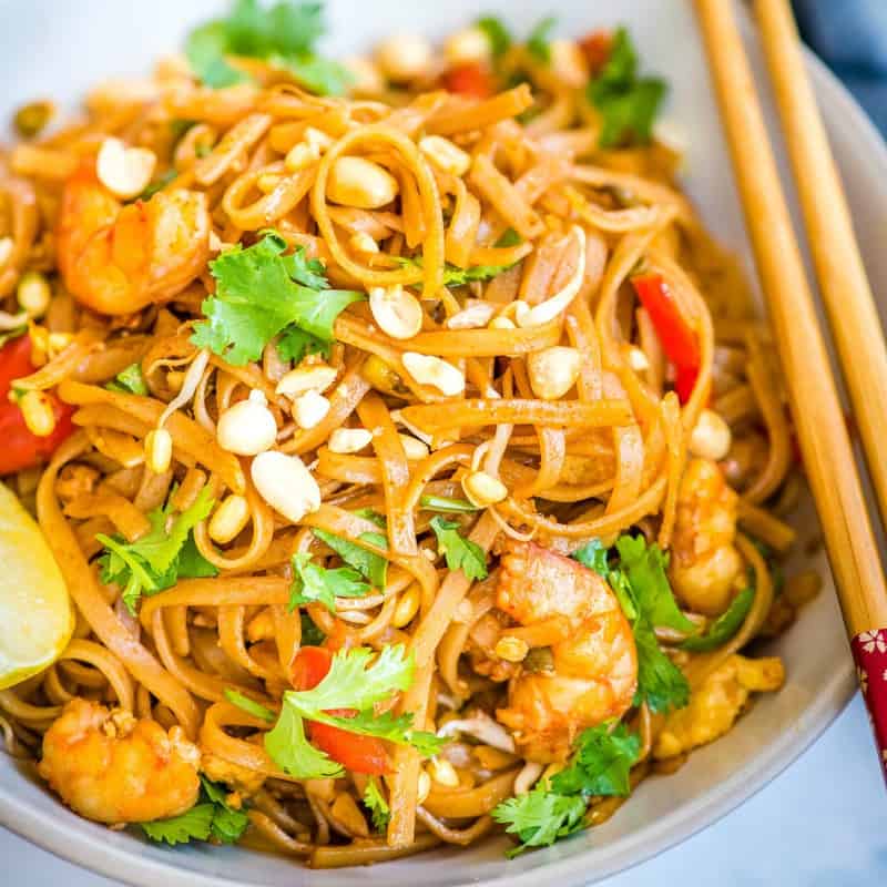 Pad Thai is a one-pot dish made with flat rice noodles, chicken or shrimp, bean sprouts, and a sweet-savory sauce. It's healthy and easy to make!