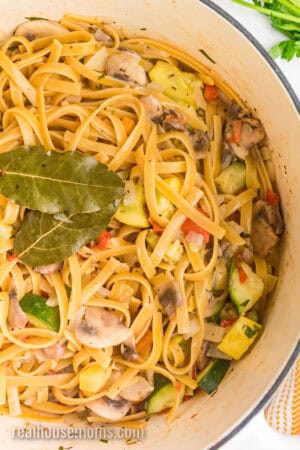 looking down at a pot of vegetable pasta after cooking