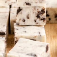 stack of 3 pieces of oreo fudge with recipe name at the bottom