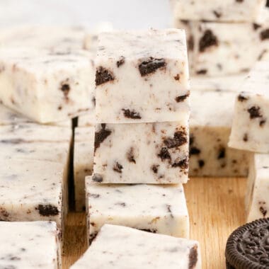 square image of oreo fudge stacked on a cutting board