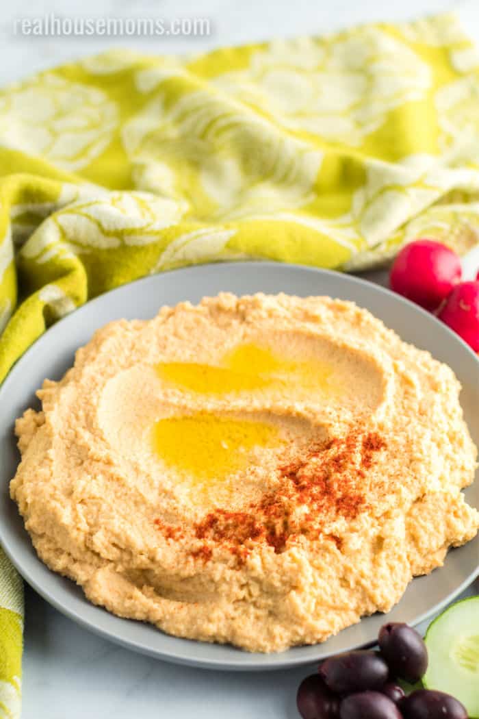 paleo cauliflower hummus in a bowl ready for serving