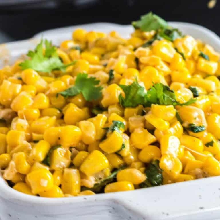 Full of zesty, creamy cheese flavor, this Parmesan Cilantro Corn is the perfect side dish for your favorite meal. Even my kids beg for a second helping!