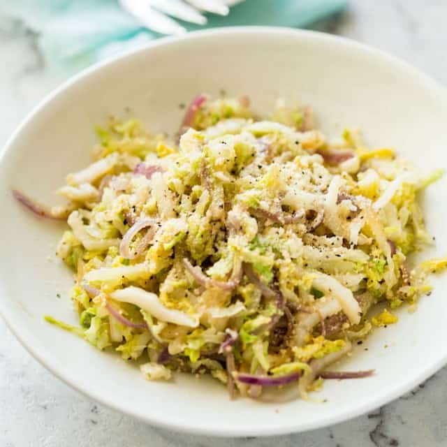 Parmesan Garlic Cabbage is a fabulous way to turn a cabbage into a side dish so tasty that even cabbage-haters will scarf this down!