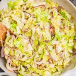 square image of parmesan garlic cabbage in a skillet