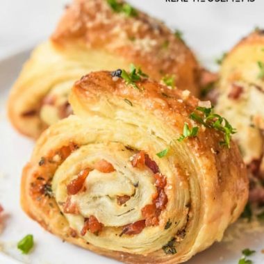 These Parmesan Puff Pastry Pinwheels are an easy appetizer recipe of light and fluffy puff pastry filled with Parmesan, pancetta, and parsley!