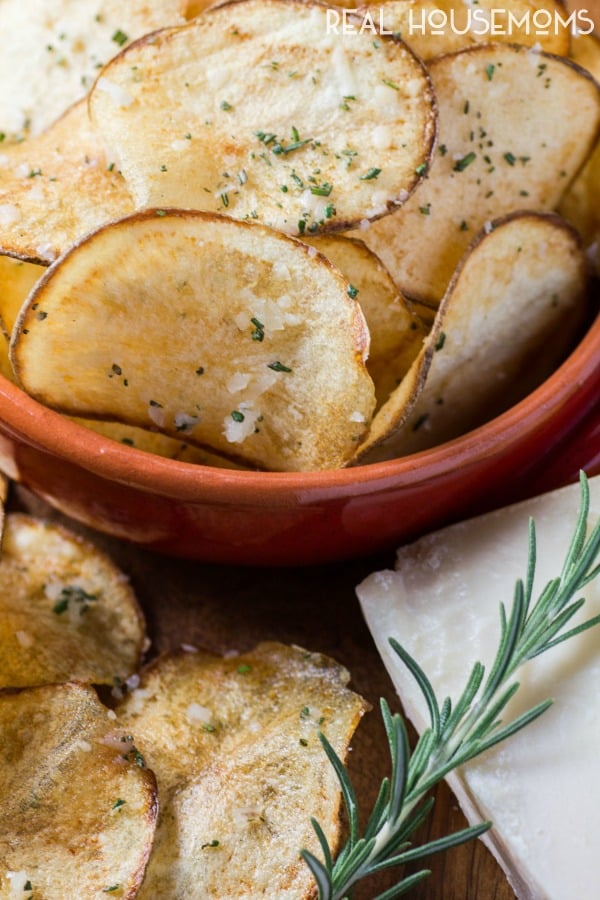 Taking a simple potato & making it into a delicious snack is easier than you think. These crispy PARMESAN ROSEMARY POTATO CHIPS are a loaded with flavor!