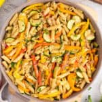 square image of pasta primavera in a skillet