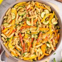 square image of pasta primavera in a skillet