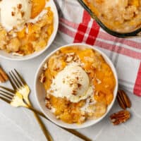 bowls of peach dump cake next to the baking dish with recipe name at the bottom