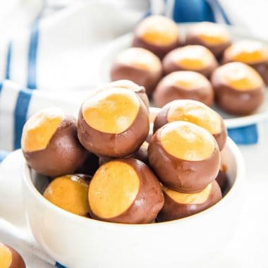 Chocolate and peanut butter are a match made in dessert heaven. These Peanut Butter Balls (Buckeye Balls) are easy, delicious and PERFECT for the holidays!