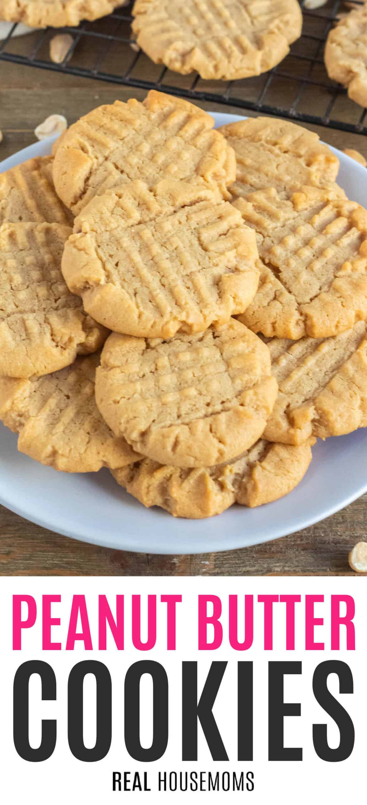 peanut butter cookies piled on a plate with recipe name at the bottom