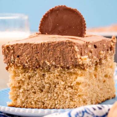 square image of peanut butter sheet cake topped with a reese's peanut butter cup