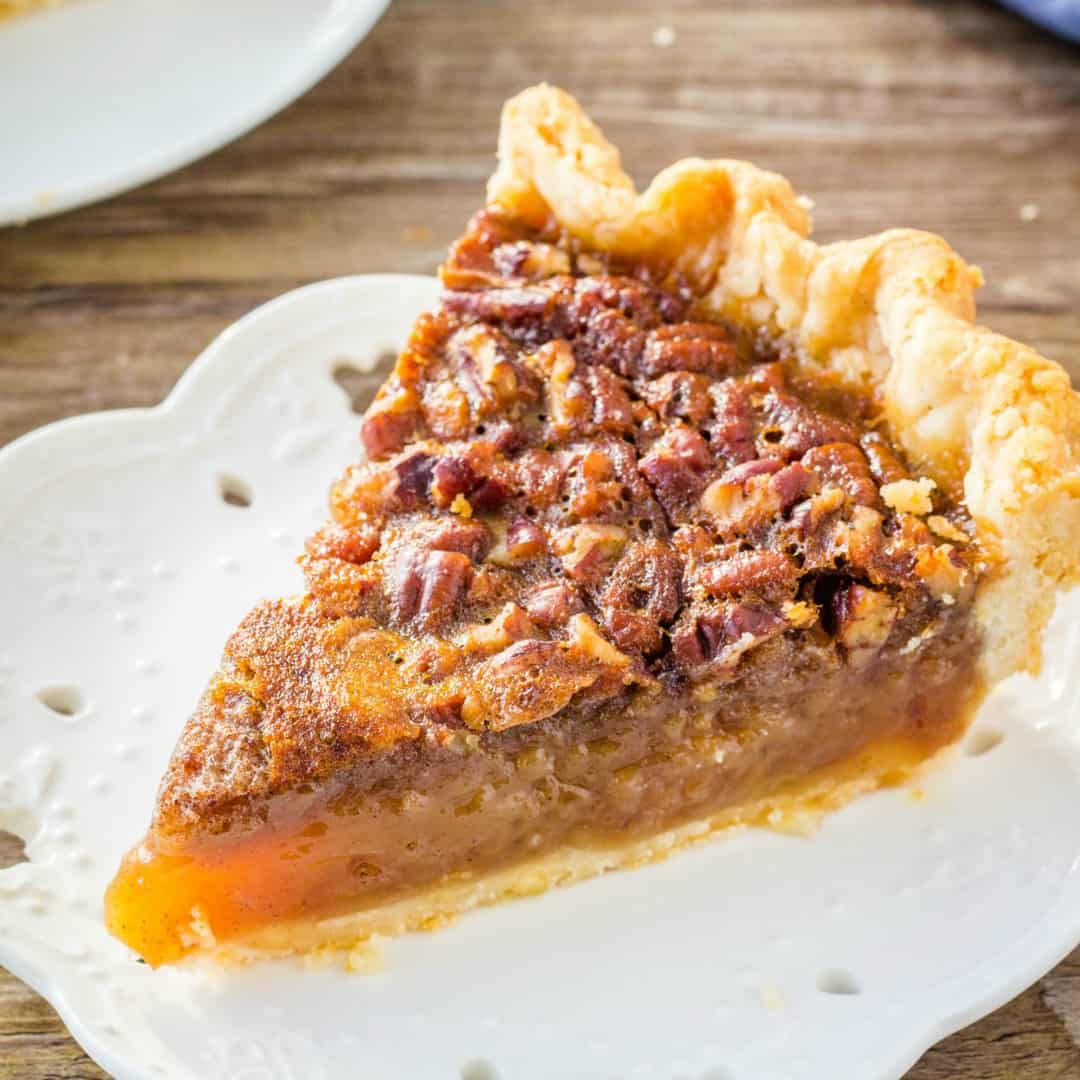 You can't go wrong with this classic Pecan Pie recipe. With a delicious caramel flavor, tons of chopped pecans and a hint of cinnamon - it's the best pecan pie I've ever tried!