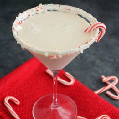 This Peppermint Bark Martini is the ultimate peppermint cocktail perfect for celebrating the holiday season! Made with Rum Chata, Creme de Cocoa & Peppermint Schnapps, this martini has a creamy texture and fantastic peppermint flavor!