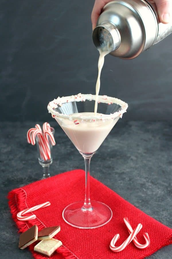 The ultimate peppermint cocktail perfect for celebrating the season! This Peppermint Bark Martini is made with Rum Chata, Creme de Cocoa, and Peppermint Schnapps giving it the perfect creamy texture and fantastic peppermint flavor. 
