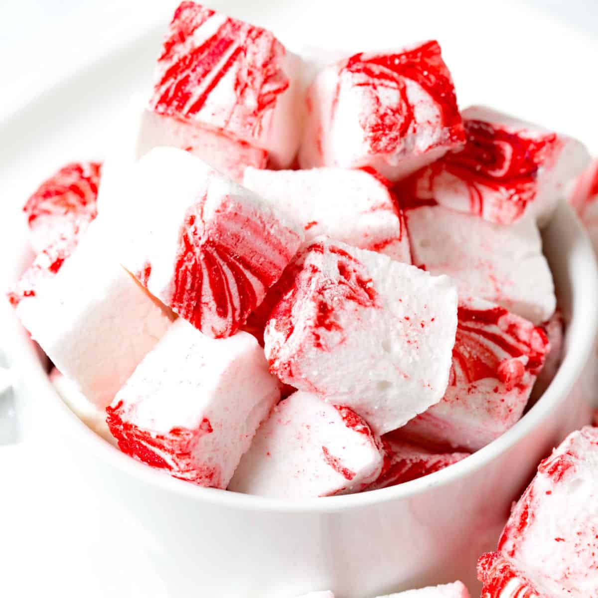 square image of a bowl filled with peppermint marshmallows