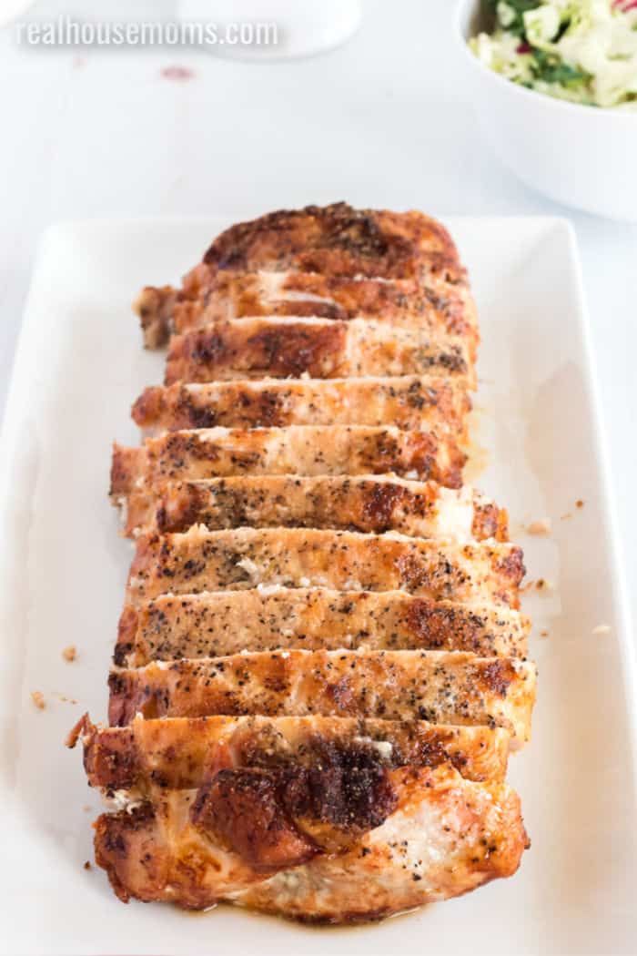 sliced pork loin on a serving platter