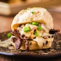 Philly Cheese Steak Sliders are the best!! With tender beef, melted cheese & garlic butter buns, these sandwiches a party favorite, especially on game day!
