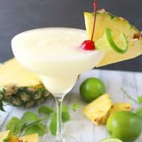 The perfect Pina Colada! This classic cocktail will be your favorite summer drink, perfect for sipping poolside or at the beach!