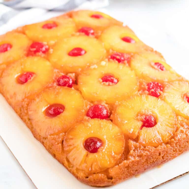 Coconut extract is added to a traditional pineapple upside down cake to turn it into a pina colada pineapple upside down cake everyone will love!