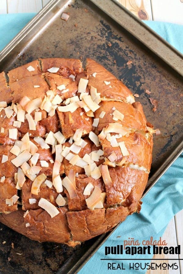If you are looking for a sweet tropical treat that will feed a crowd, you can't go wrong with this easy to make PIÑA COLADA PULL-APART BREAD!