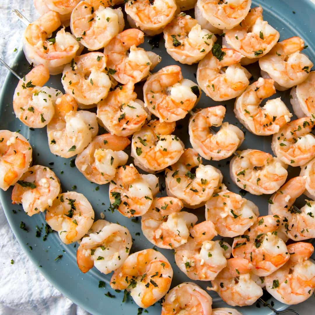 Pineapple Coconut Lime Shrimp Skewers are loaded with succulent and juicy shrimp, coated in a pineapple coconut lime marinade, and grilled to perfection. These tasty skewers will take your taste buds to the islands!
