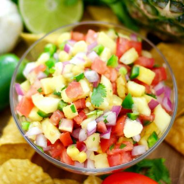 Fresh Pineapple Salsa is an incredibly easy recipe that wows with its colorful presentation.  Just a few simple ingredients and you have an appetizer that's flavorful & delicious!