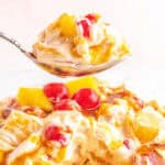 square image of a spoonful of pineapple upside down fluff over the serving bowl