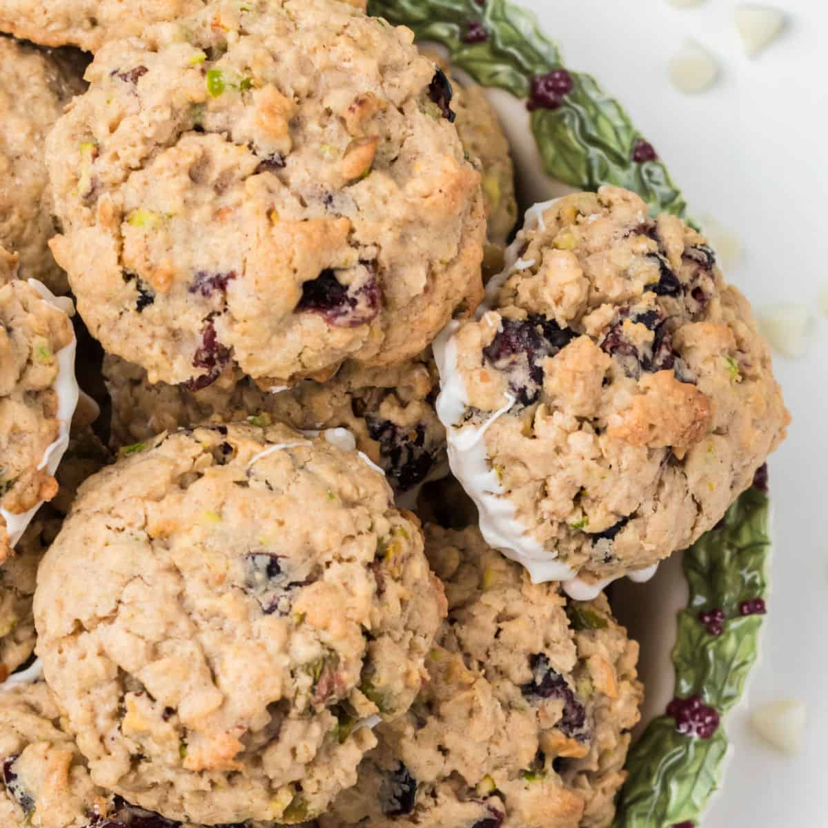 square image of pistachio cranberry oatmeal cookies in a bowl