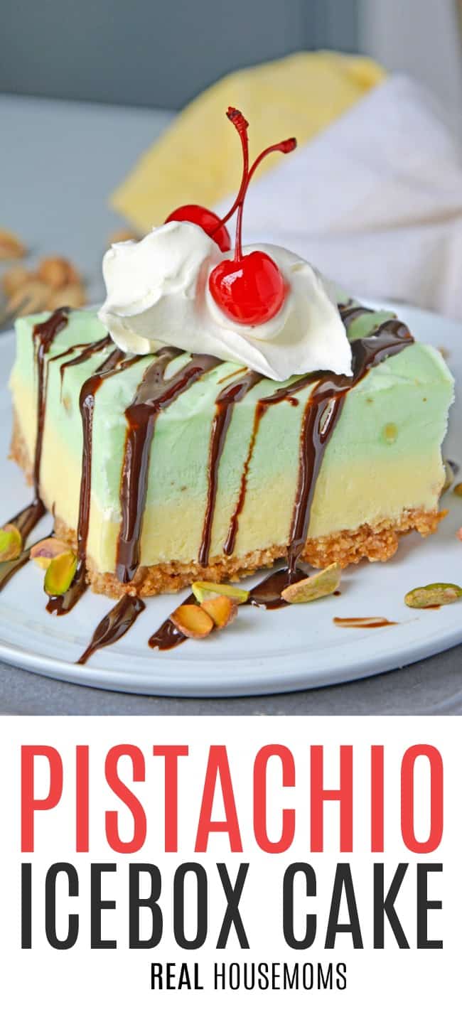 A slice of pistachio icebox cake topped with chocolate syrup, whipped cream, pistachios, and a cherry