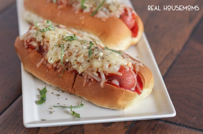 PIZZA HOT DOGS take on a fun new flavor featuring pepperoni, sauce, and gooey cheese for the ultimate kid-pleasing meal!